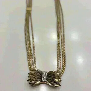 Stella and Daughter gold bow necklace with rhinestones.